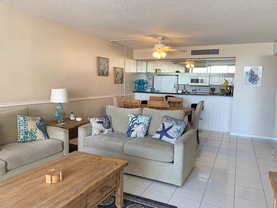 440 West 804 N Beachy decor furniture complements the abundance of sunshine entering the living room