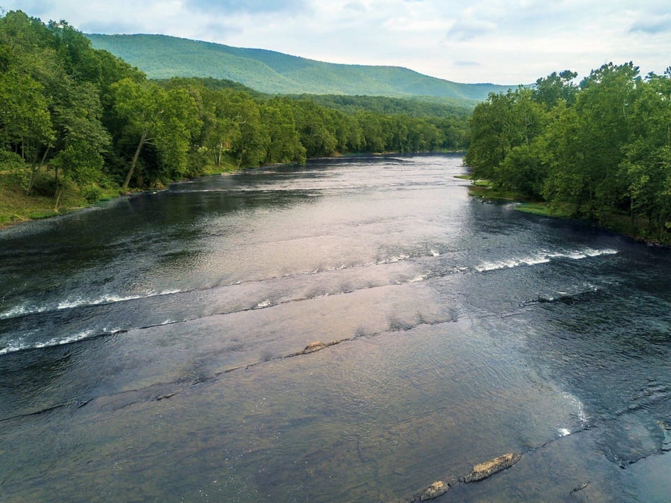 Rapids and river near the cabin (this shot taken with a drone a few feet above the water)