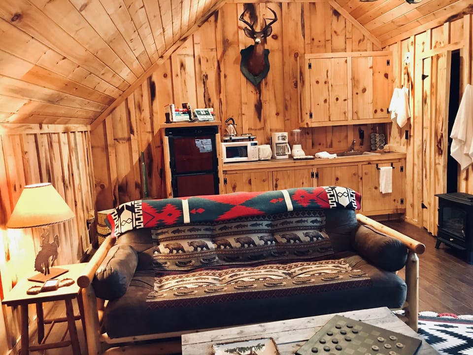 Full size Futon with linens available.