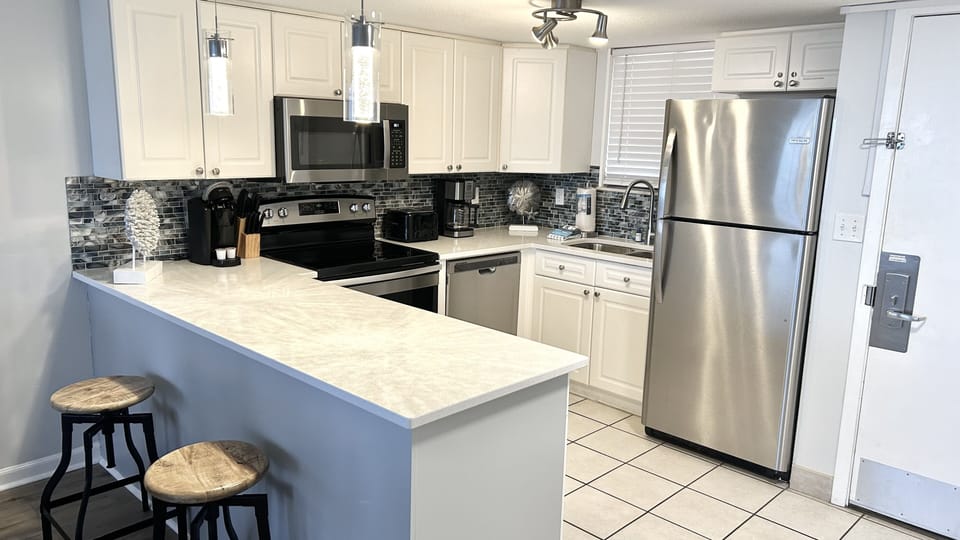 Spacious kitchen with everything needed to cook in and all appliances 