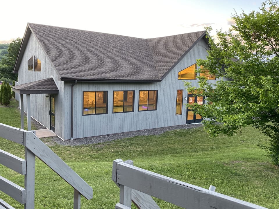 Off our back deck access to Pool House with hot tub.