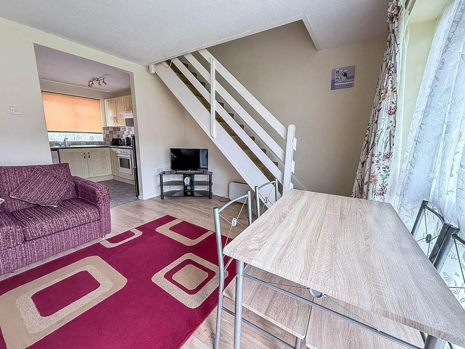 Unwind in the living room of your holiday chalet after a day of seaside fun on the Norfolk coastline, making your staycation in Hemsby a truly relaxing escape.