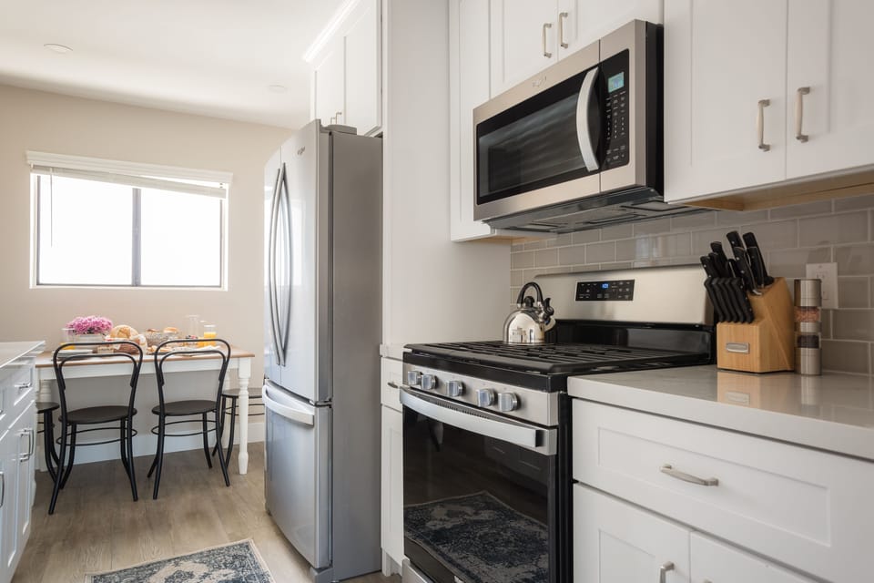 Kitchen features modern appliances.
