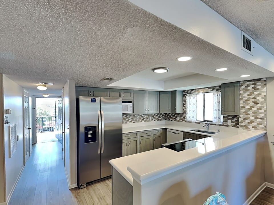 Fully Equipped Kitchen with Stainless Steel Appliances