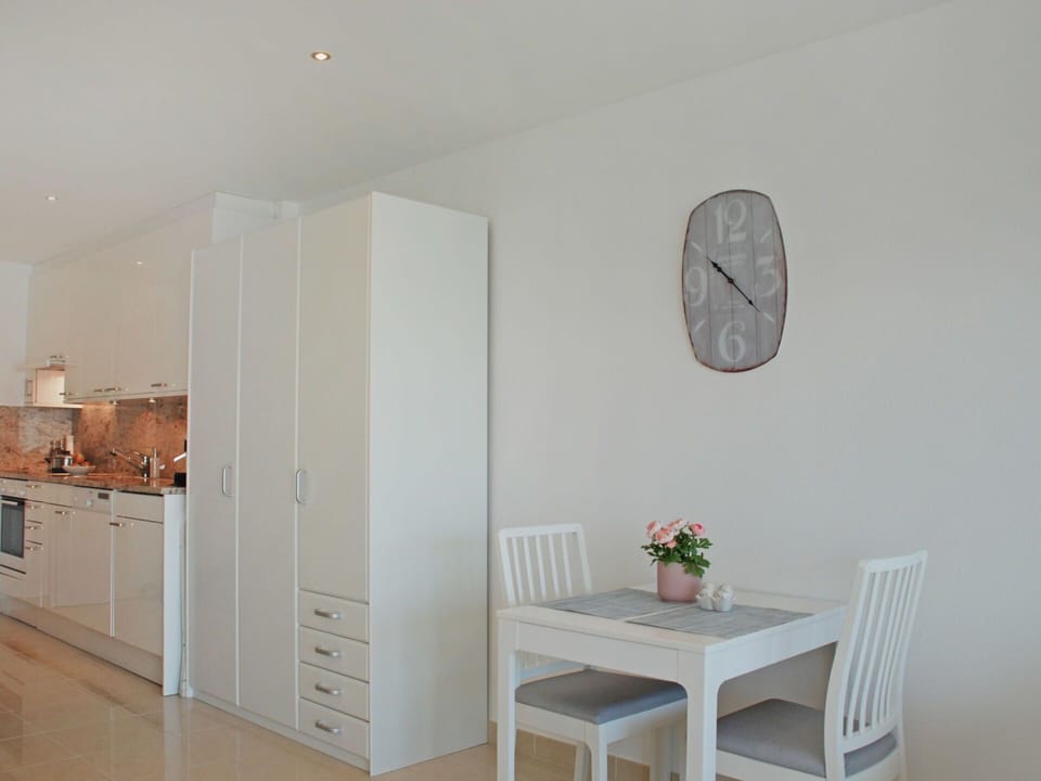 White, Room, Property, Interior Design, Furniture, Floor, Wall, Ceiling, House, Table