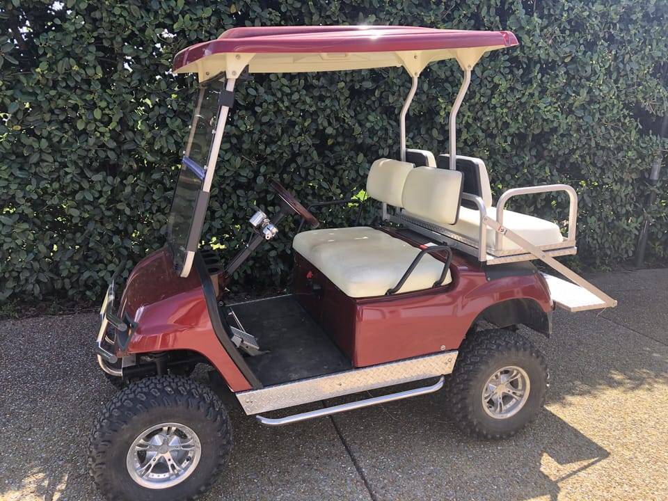 Golf cart (included)
