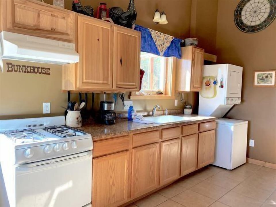 The light filled kitchen makes preparing meals a pleasure.