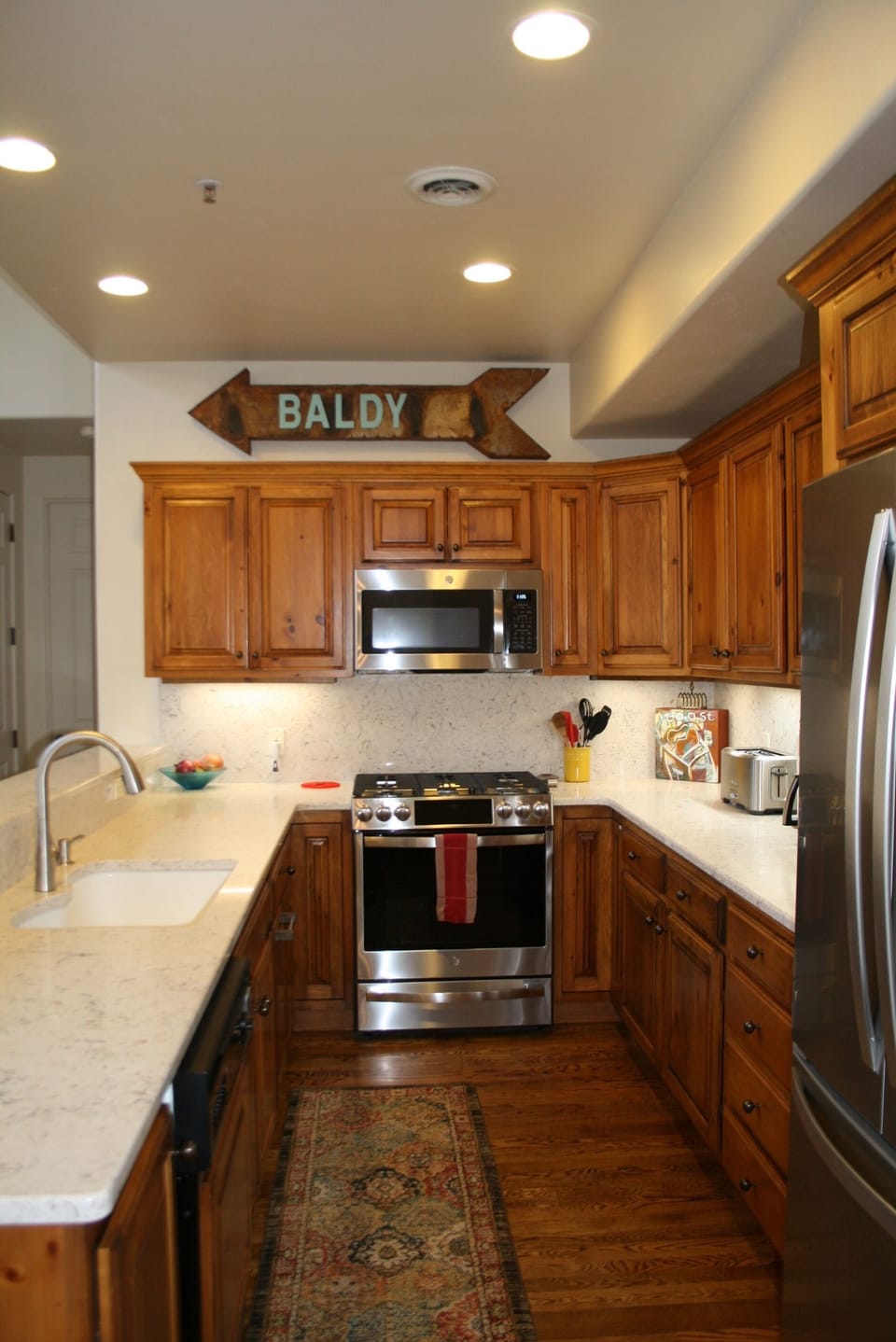 Kitchen with gas stove.