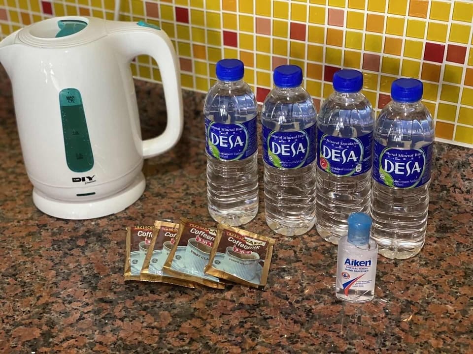 Kettle, mineral water, instant coffee provided