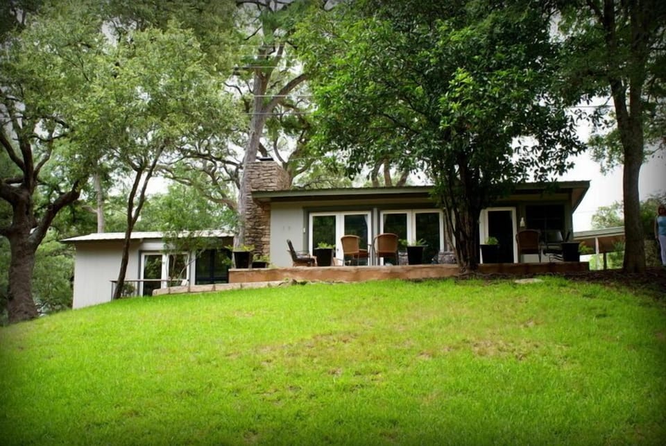 Large windows overlooking the creek