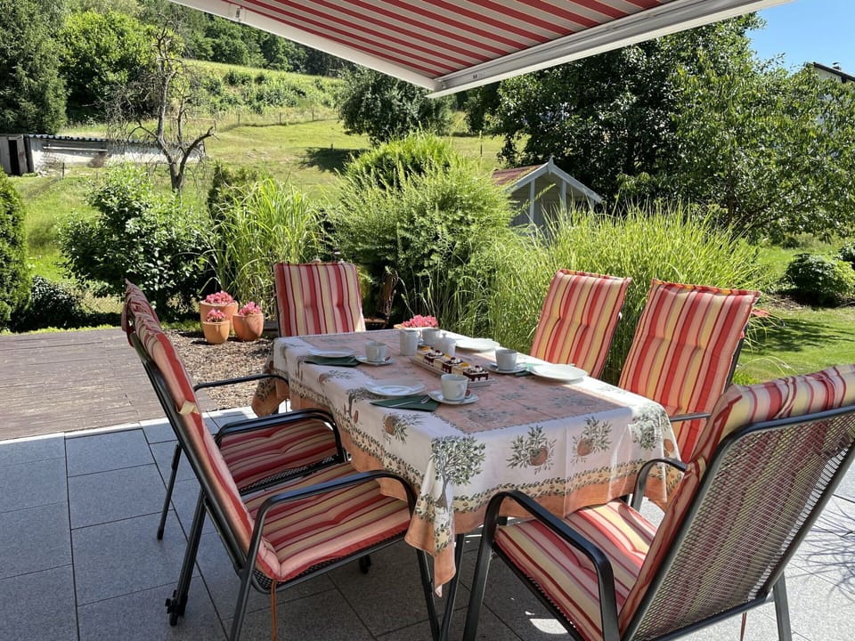 Table, Plant, Furniture, Property, Chair, Outdoor Table, Tree, Outdoor Furniture, Shade, Wood