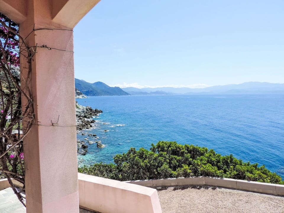 Water, Sky, Property, Building, Azure, Plant, Wood, Mountain, Coastal And Oceanic Landforms, Real Estate