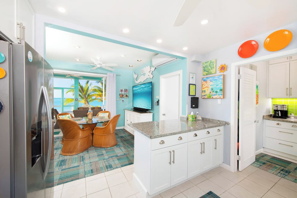Full kitchen overlooking the living area.