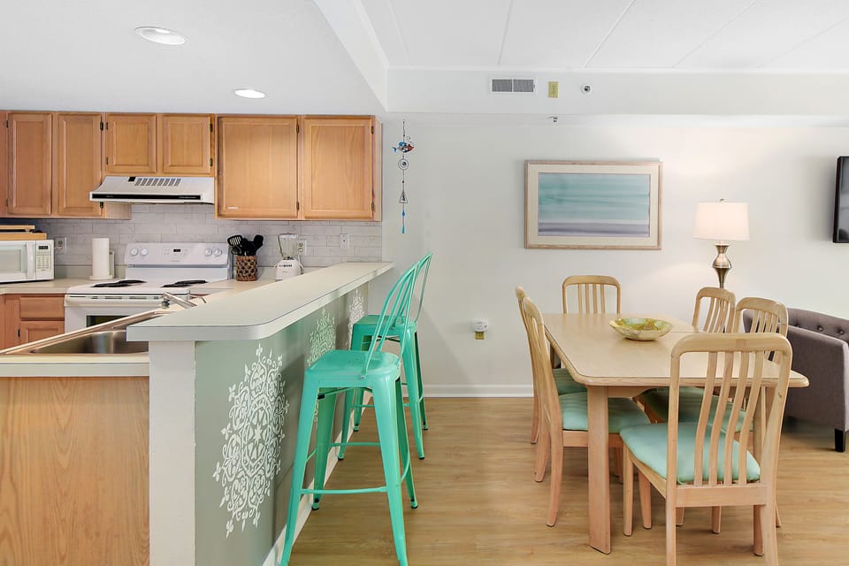 Breakfast bar and table ready for family time and sharing memories.