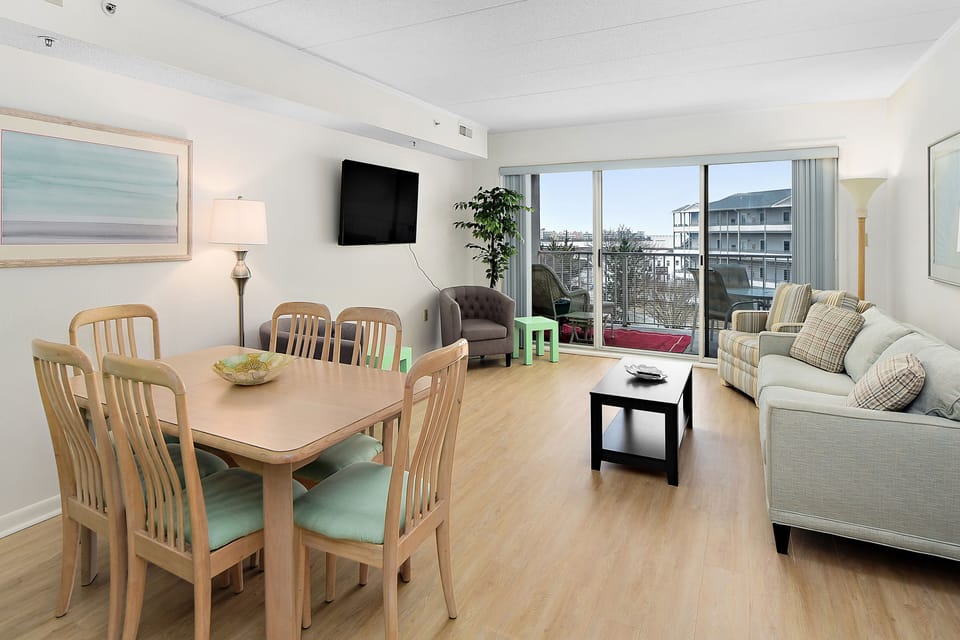Spacious living area with pull out couch and comfy seating!