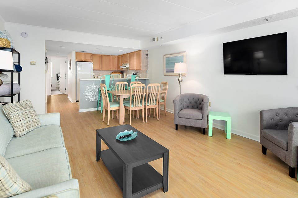 Spacious living area with pull-out couch and comfy seating!