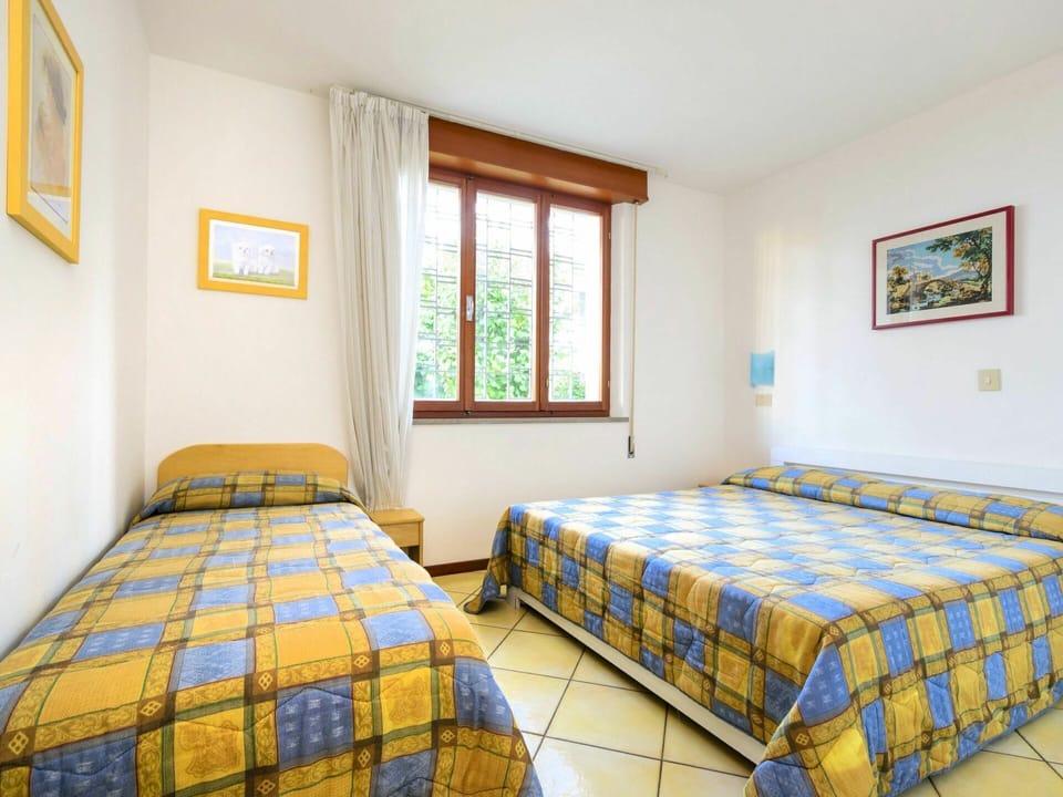 Bedroom, Room, Bed Sheet, Bed, Furniture, Property, Bed Frame, Yellow, Bedding, Interior Design