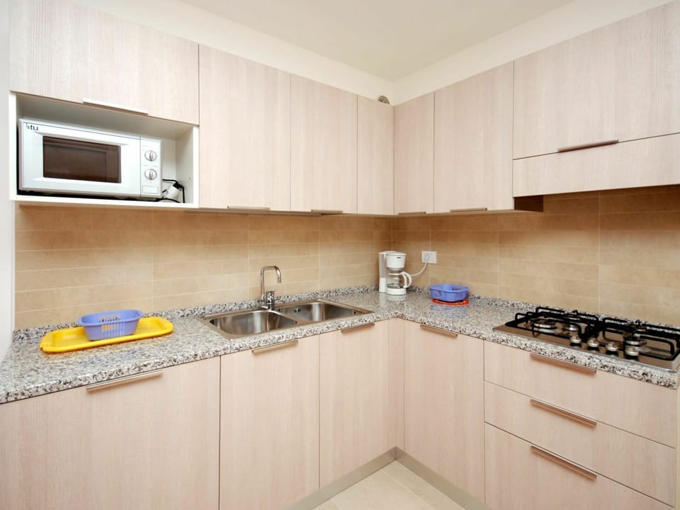 Property, Room, Kitchen, Countertop, Cabinetry, Furniture, Interior Design, Yellow, Building, Real Estate