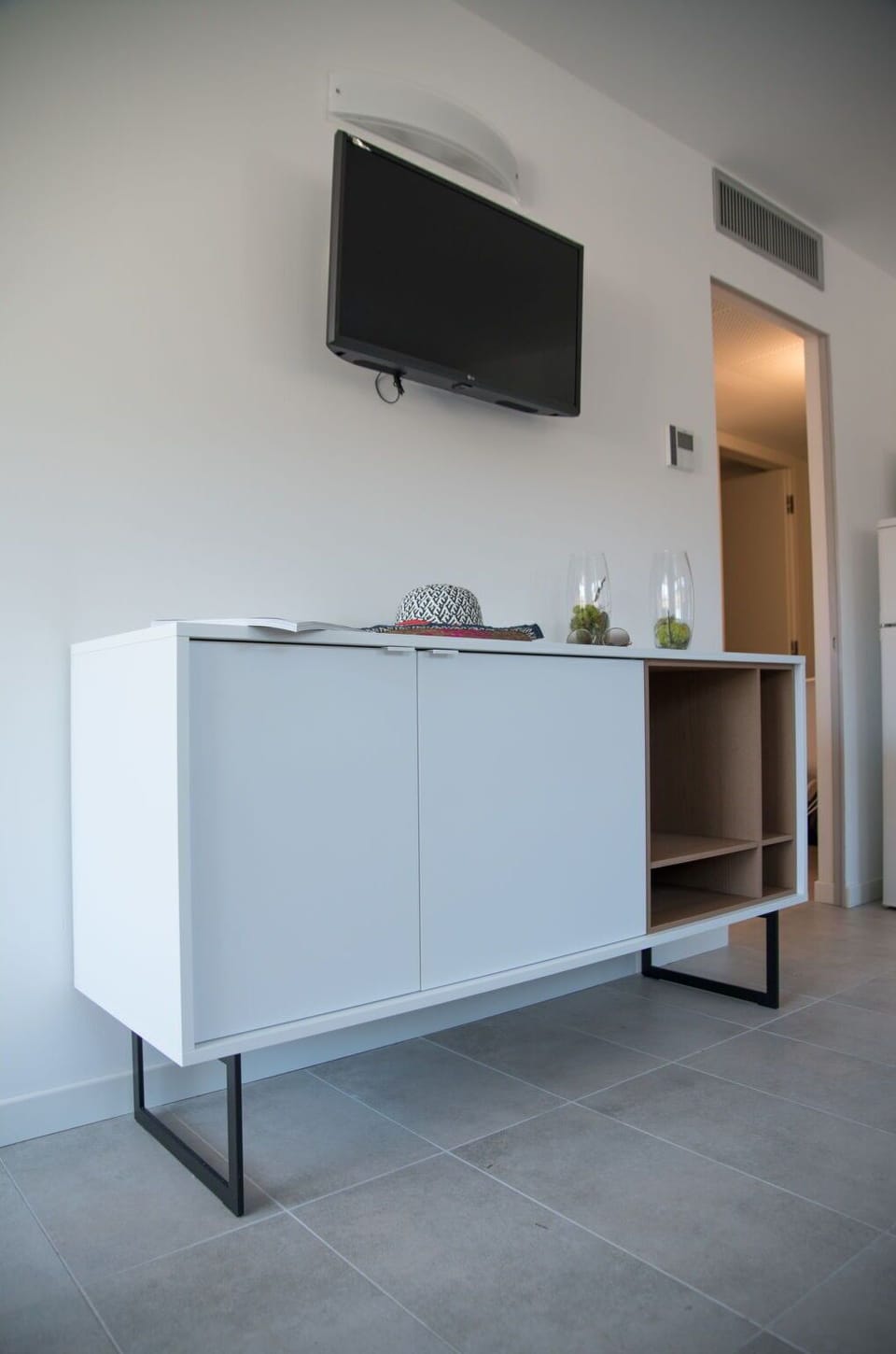 Furniture, Shelving, Cabinetry, Wood, Floor, Flooring, Material Property, Hardwood, Rectangle, Television