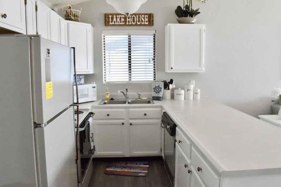 Oven, Stove, Refrigerator, Dishwasher, Garbage Disposal.