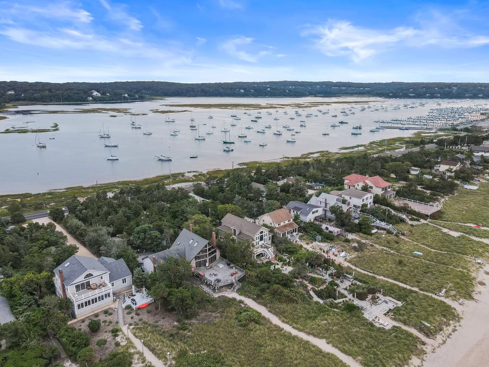 Aerial facing south to Mount Sinai Harbor.
(Orange Kayak)