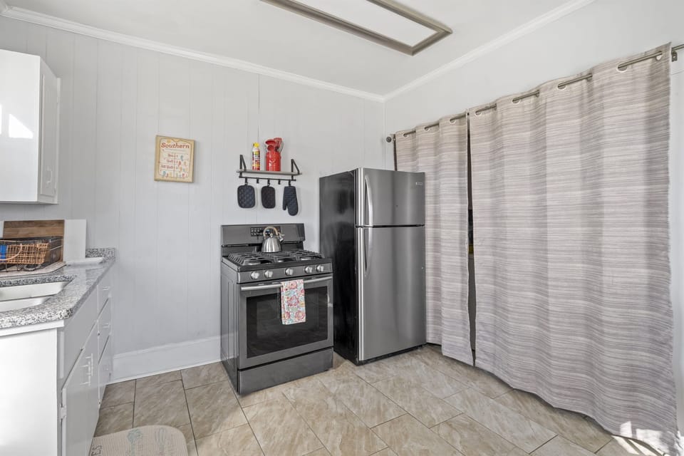 Gas range and full size refrigerator