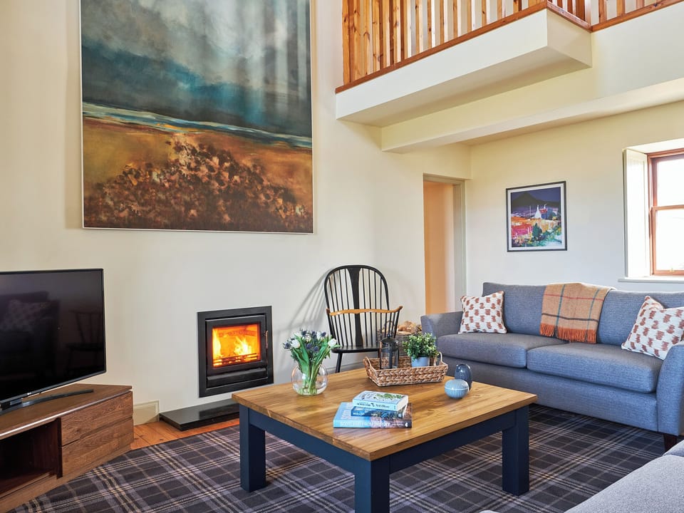 Spacious living room with wood burner | Midcraigs, Glencraigs, near Campbeltown