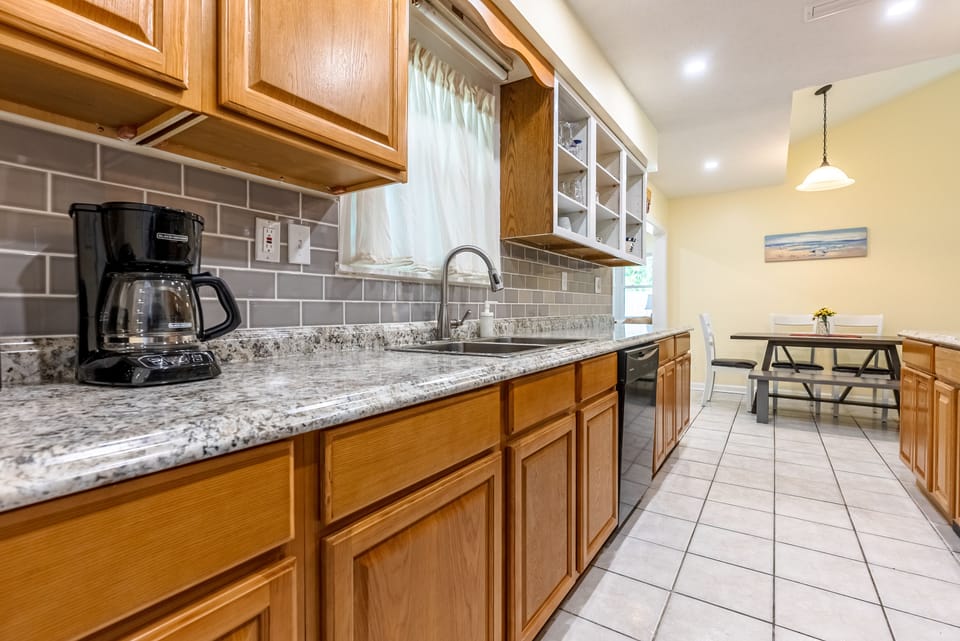 Tons of cabinets in this well equipped kitchen