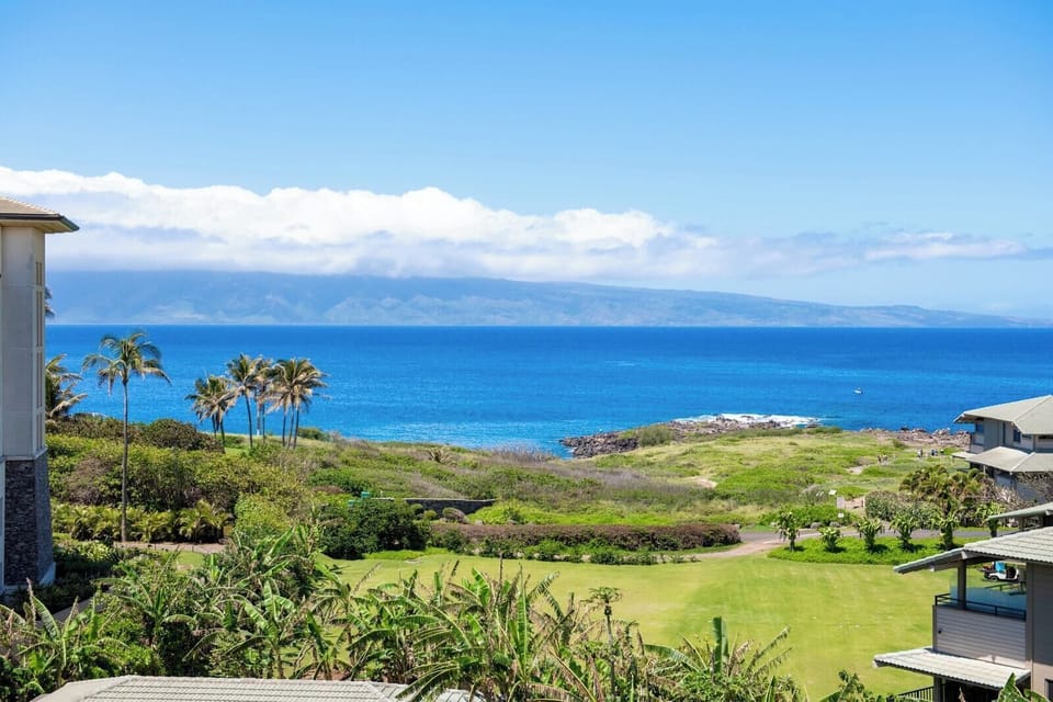  From your private lanai, gaze over rooftops wrapped in palm fronds and beyond to where sapphire seas kiss the sky  