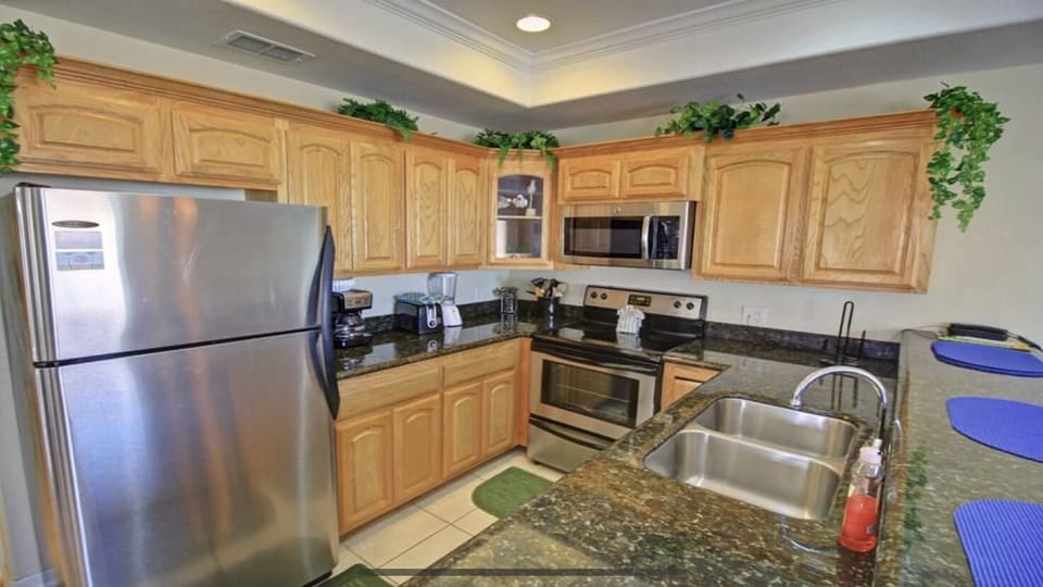 Fully stocked kitchen includes coffee maker, blender, dishwasher, pots, pans etc