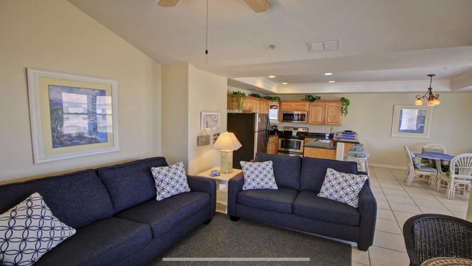 View from living room to dining and kitchen.
