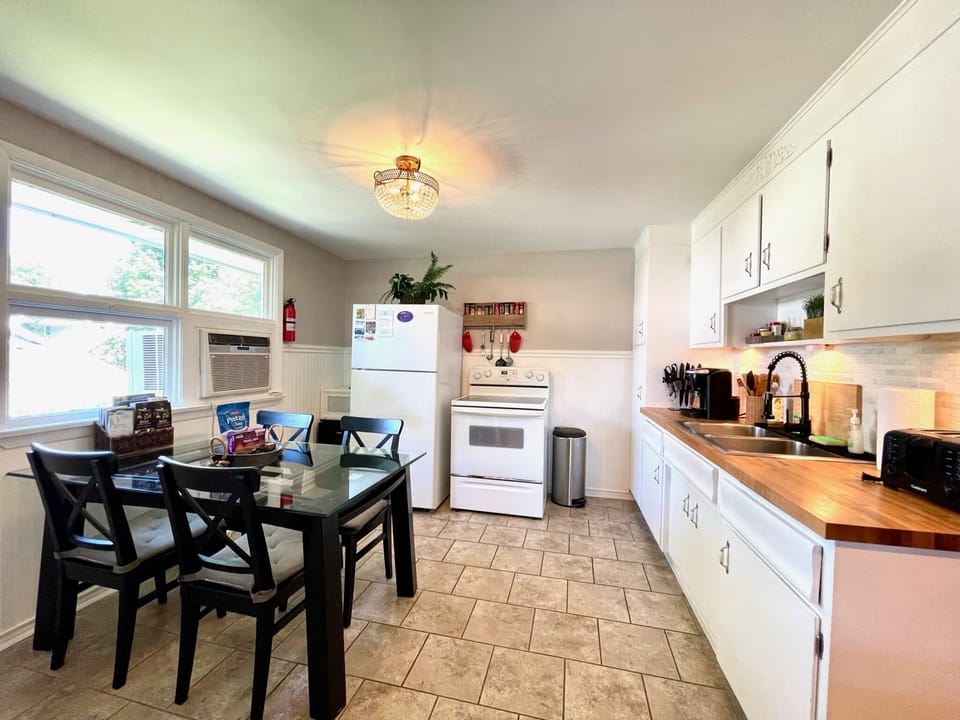 Full size fridge, stove & stocked kitchen make stays feel like home. :)
