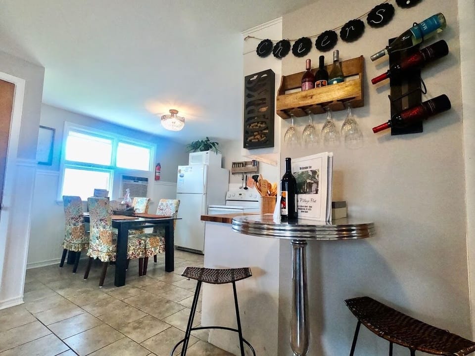High top table /Wine bar provides extra seating and conversation space.