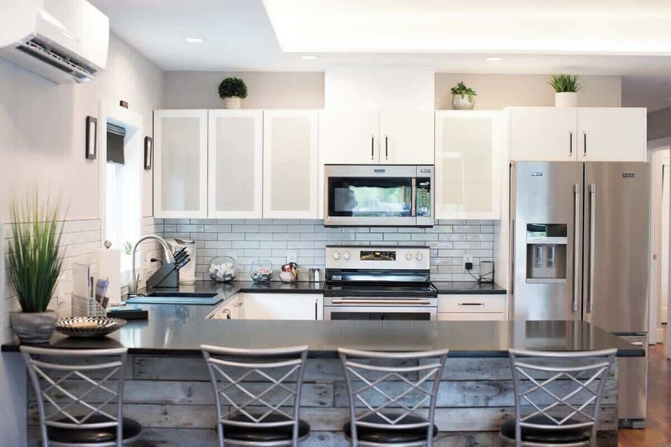 Peninsula seating makes meal prep and conversation easy.