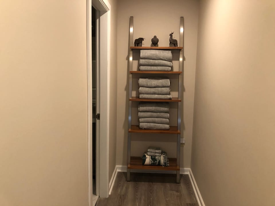 Hall to downstairs full bathroom.