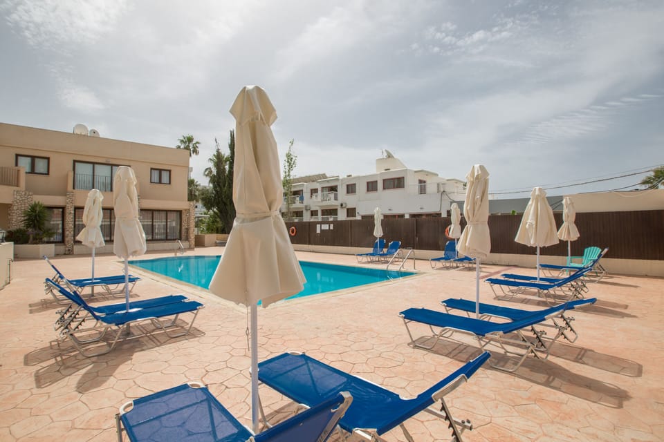 Apt. Lola with Communal Pool and Sunloungers