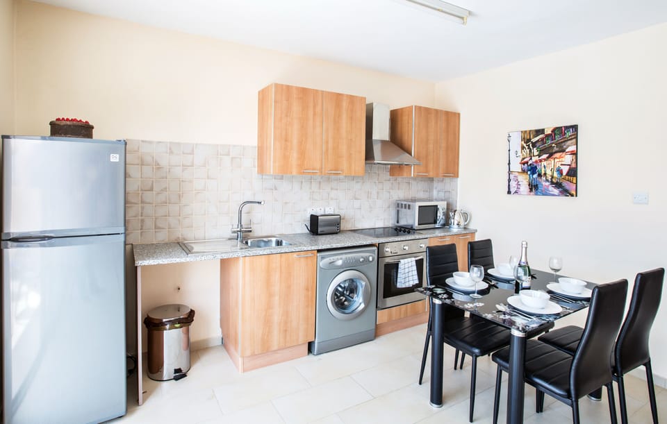 Fully Equipped kitchen and dining area