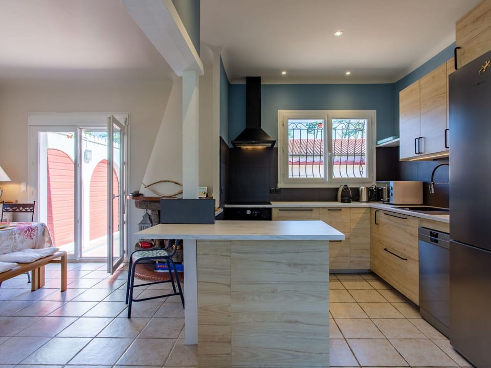 Furniture, Cabinetry, Countertop, Wood, Interior Design, Kitchen Appliance, Kitchen, Home Appliance, Table, Living Room