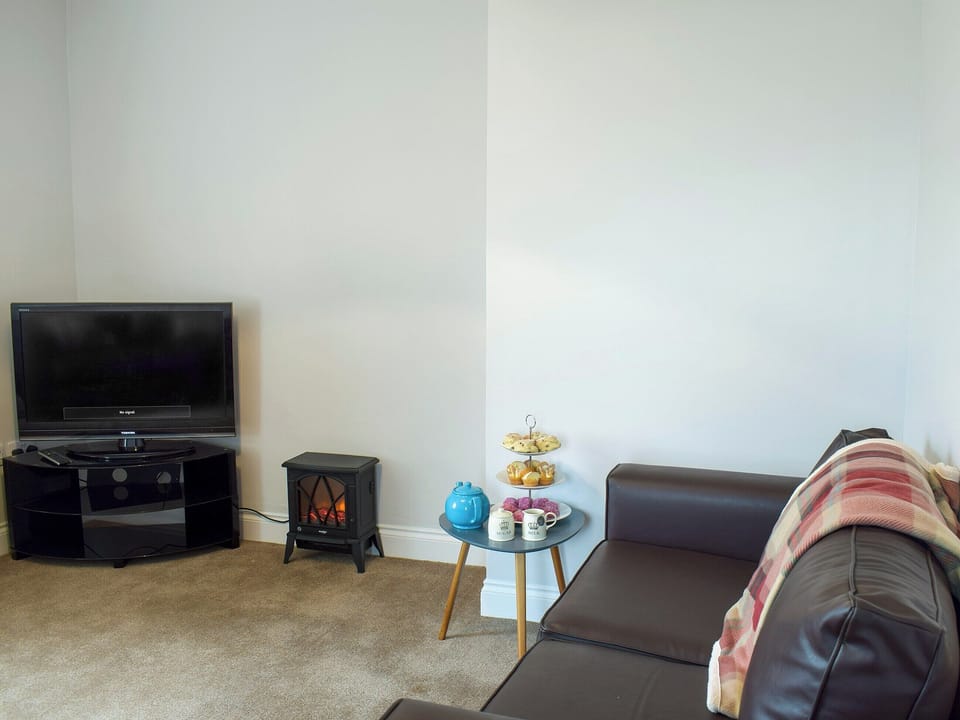 Homely living room | Brick Cottage No. 2 - Baltersan Farm, Baltersan, near Newton Stewart