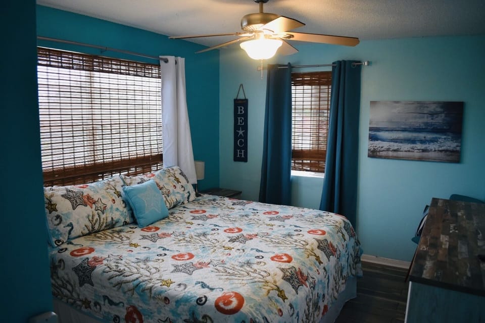 Bedroom 2 with king size bed and blackout curtains