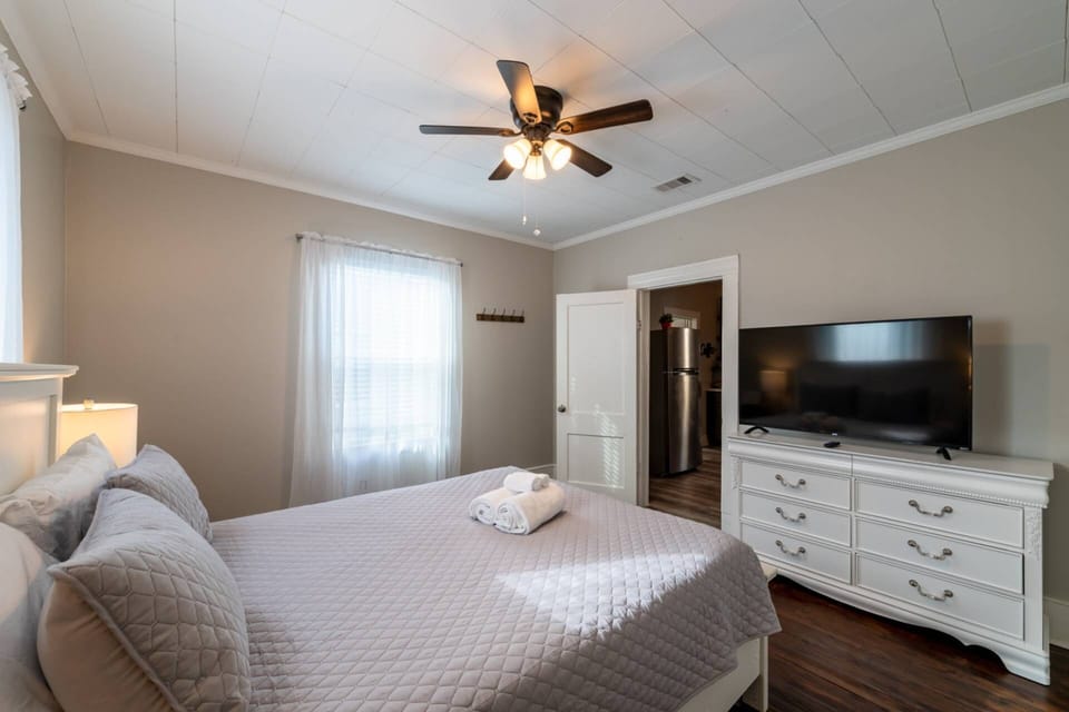 Relax and enjoy reading a book in this comfortable queen size bed