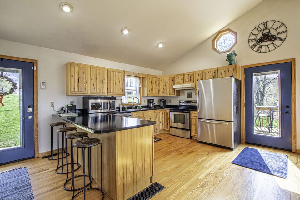 Fully Stocked Kitchen with Breakfast Bar