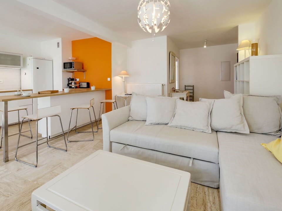 Furniture, Room, Property, Living Room, Interior Design, White, Yellow, Floor, Building, Table