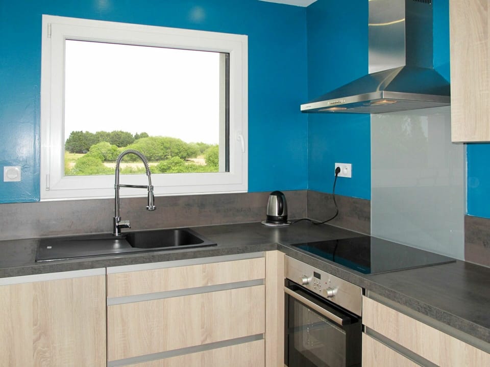 Countertop, Sink, Room, Property, Cabinetry, Tap, Turquoise, Furniture, Tile, Kitchen