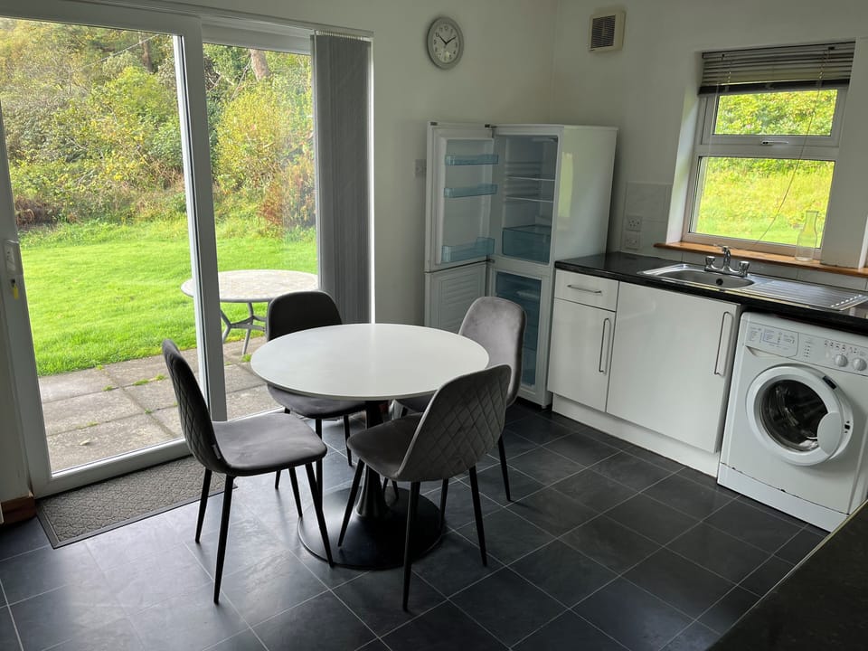 Kitchen with patio doors leading into the garden