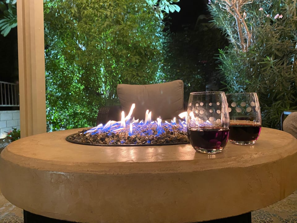 Conversation area has a propane fire table to add a little warmth and ambience.