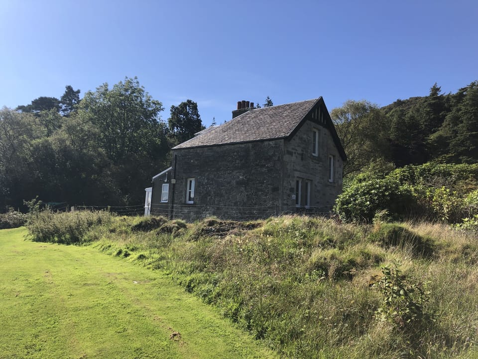 The Gardens from the side with grass area