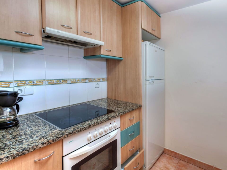 Property, Countertop, Room, Kitchen, Cabinetry, Furniture, Building, House, Kitchen Stove, Real Estate