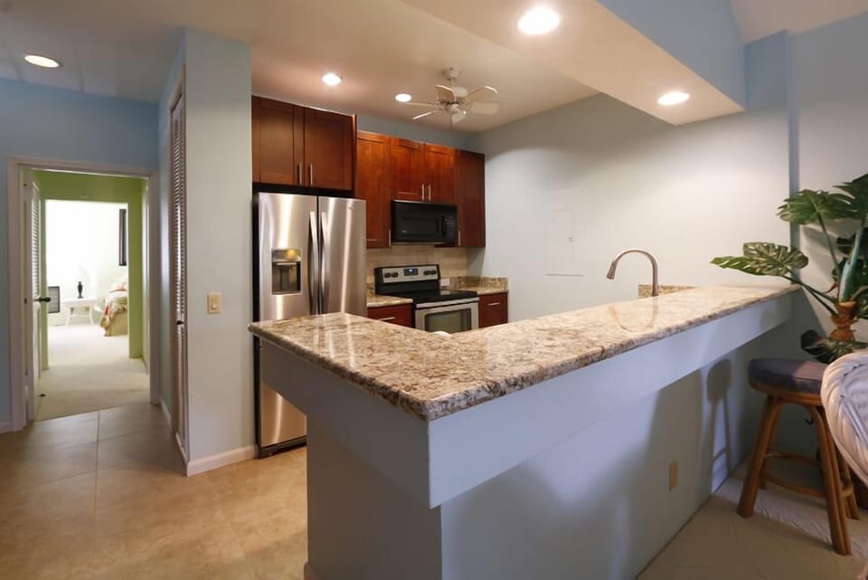 New kitchen tile, cabinets and granite countertrops