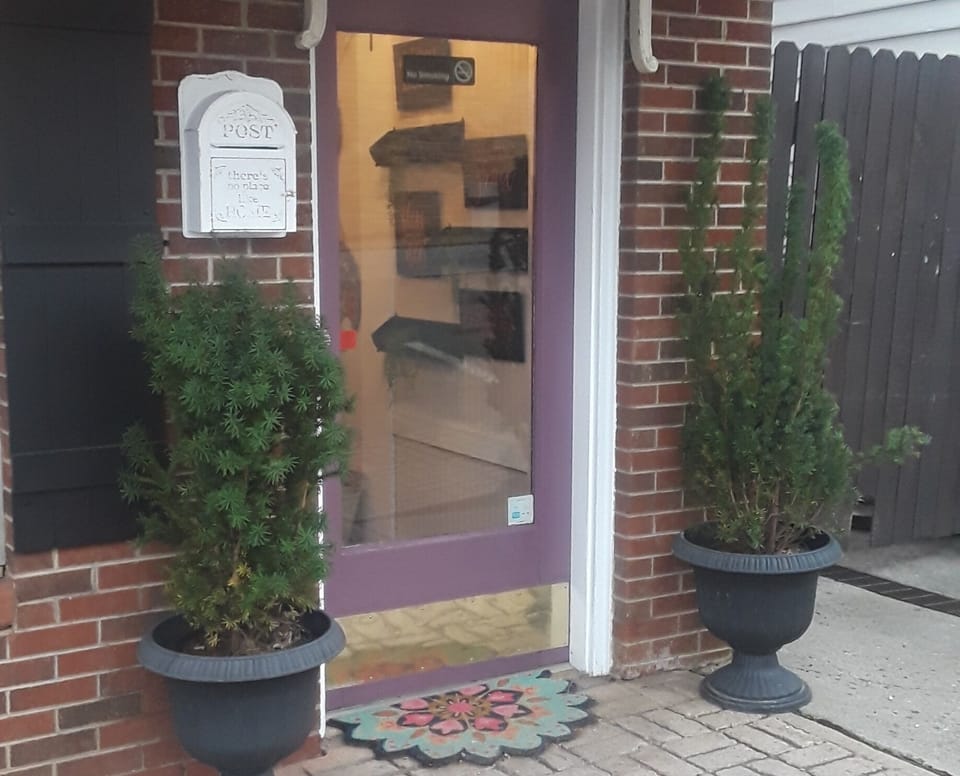 Located in historic 1855 bank building, on main st. Walk to lake and shops